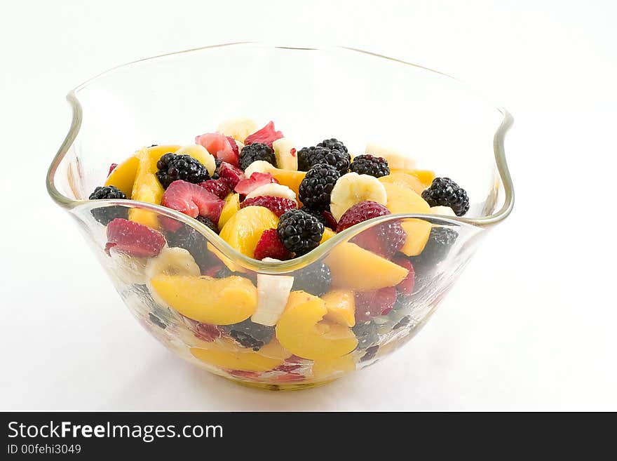 A beautiful clear glass bowl makes a wonderful home for sliced peaches, chunks of strawberries, slices of bananas and whole blackberries. A beautiful clear glass bowl makes a wonderful home for sliced peaches, chunks of strawberries, slices of bananas and whole blackberries.