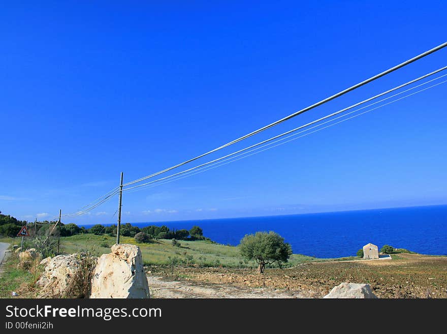 Landscape. One House on Blue. Mediterraneo. Orizont. Season summer. Sicily. Italy. Landscape. One House on Blue. Mediterraneo. Orizont. Season summer. Sicily. Italy