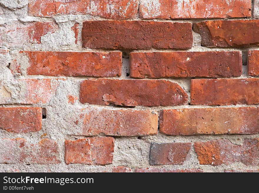 Details of a wall made from red-brown bricks. Details of a wall made from red-brown bricks