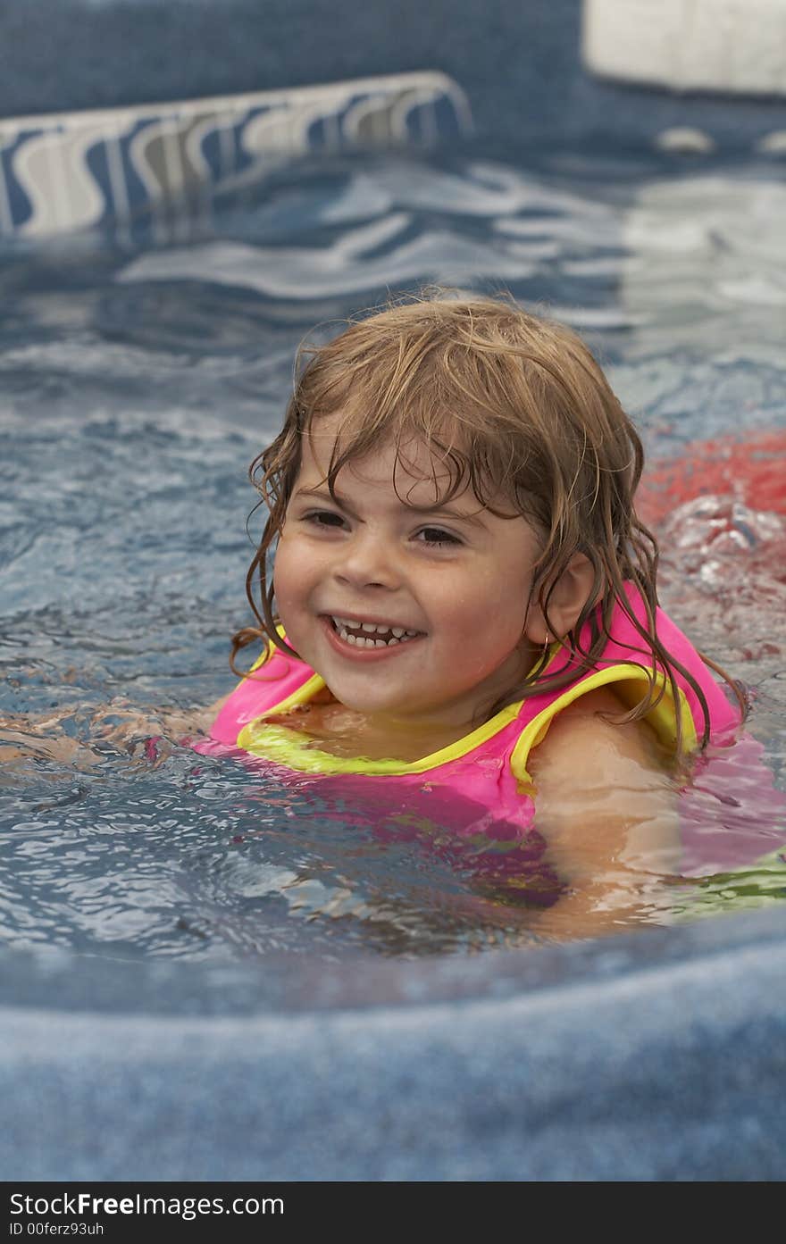 Young pretty girl and boy smiling in water. Young pretty girl and boy smiling in water