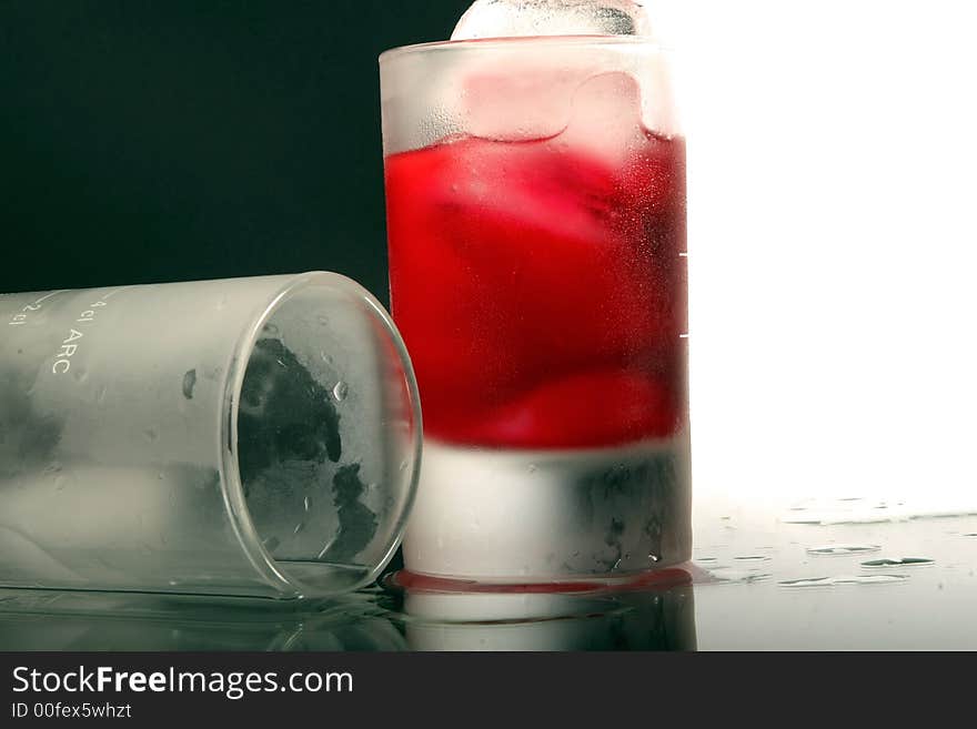 Colorful schnapps on a glass table. Colorful schnapps on a glass table