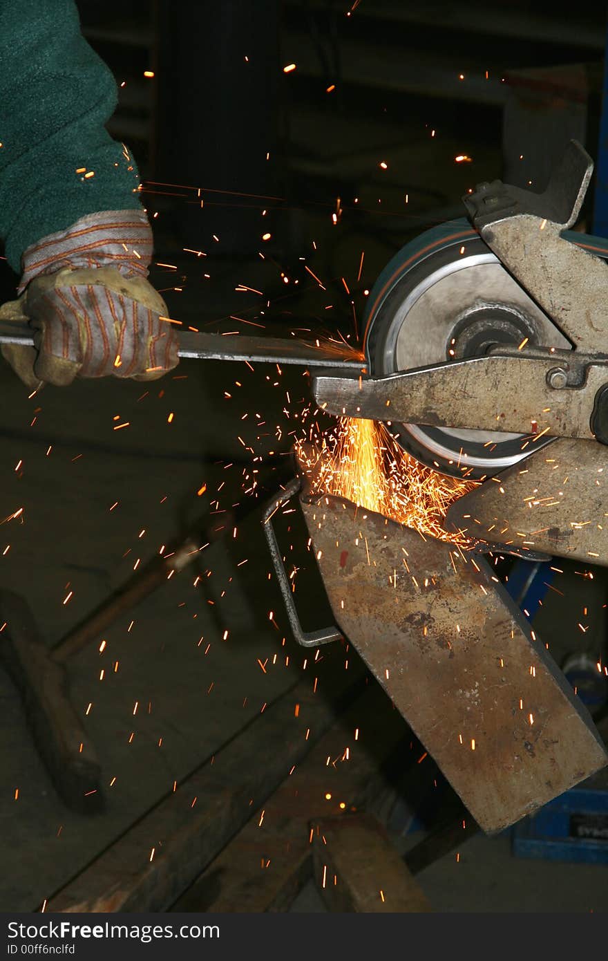 Steel being grinded in a mechanical workshop. Steel being grinded in a mechanical workshop