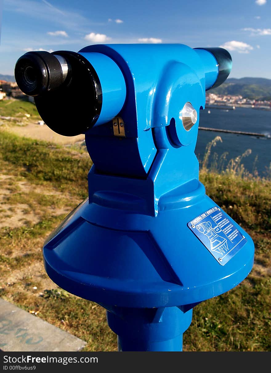 Coin operated blue telescope at algorta, spain