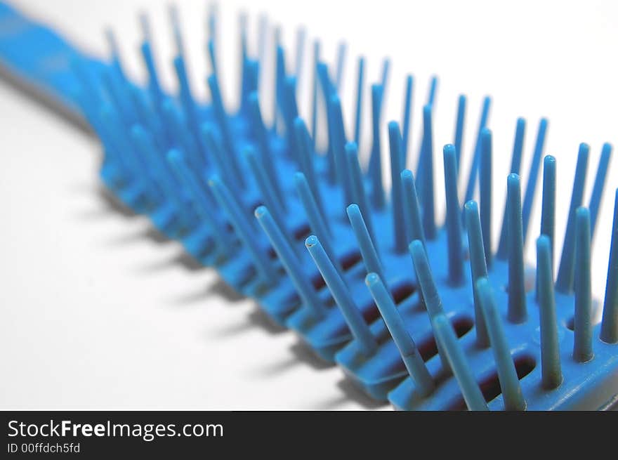 Abstract blue hairbrush