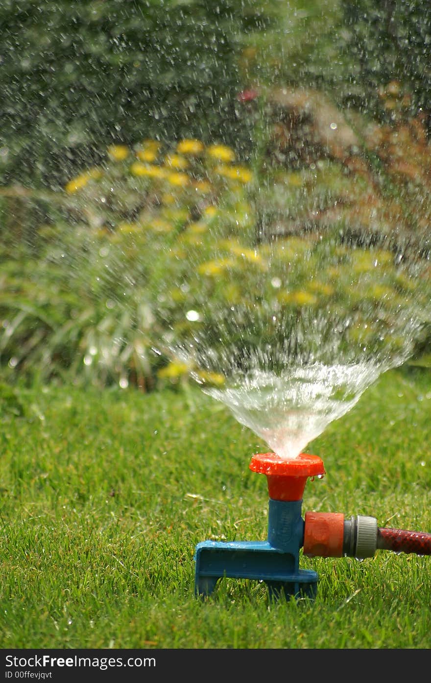 Water sprinkling from irrigation system. Water sprinkling from irrigation system