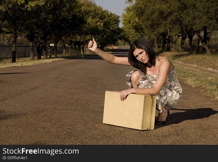 Daydress next to suitcase