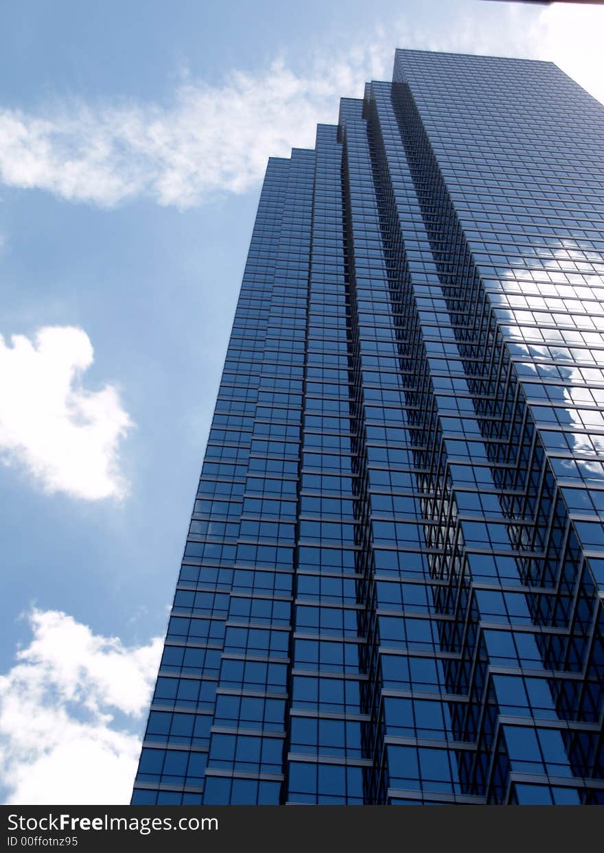 Beautiful reflections of the clouds in the glass bulidings of downtown Dallas. Beautiful reflections of the clouds in the glass bulidings of downtown Dallas