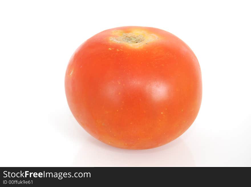 Some healthy red tomatoes on a white back drop setting. Some healthy red tomatoes on a white back drop setting.