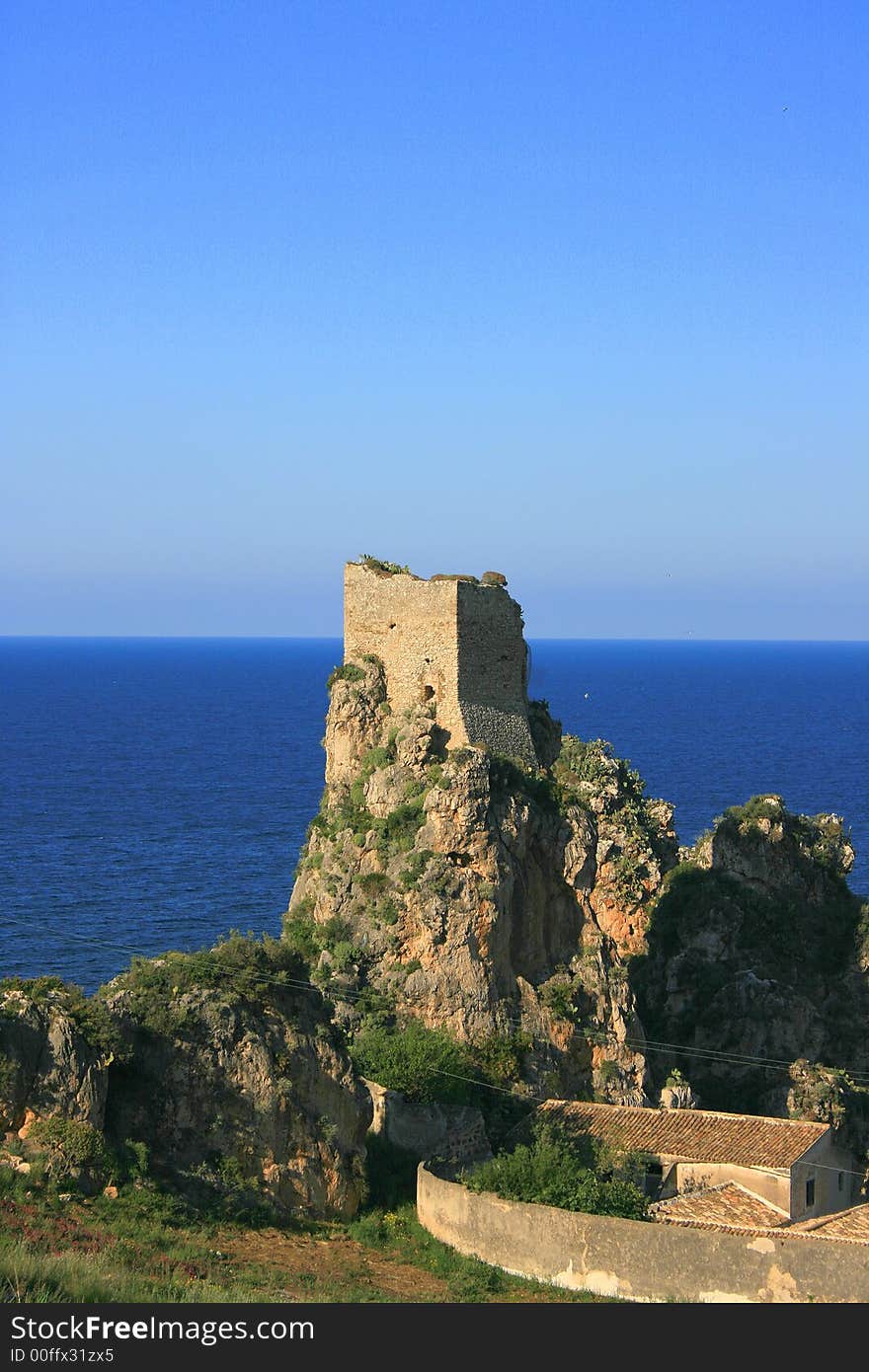 Amcient Normand tower construction and sea vpanrama. Architecture, history. sicliy, Italia. Amcient Normand tower construction and sea vpanrama. Architecture, history. sicliy, Italia.