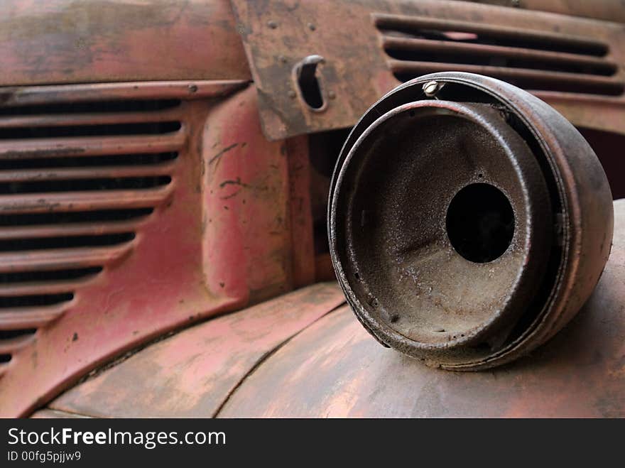 Old red truck with broken head light lamp. Old red truck with broken head light lamp