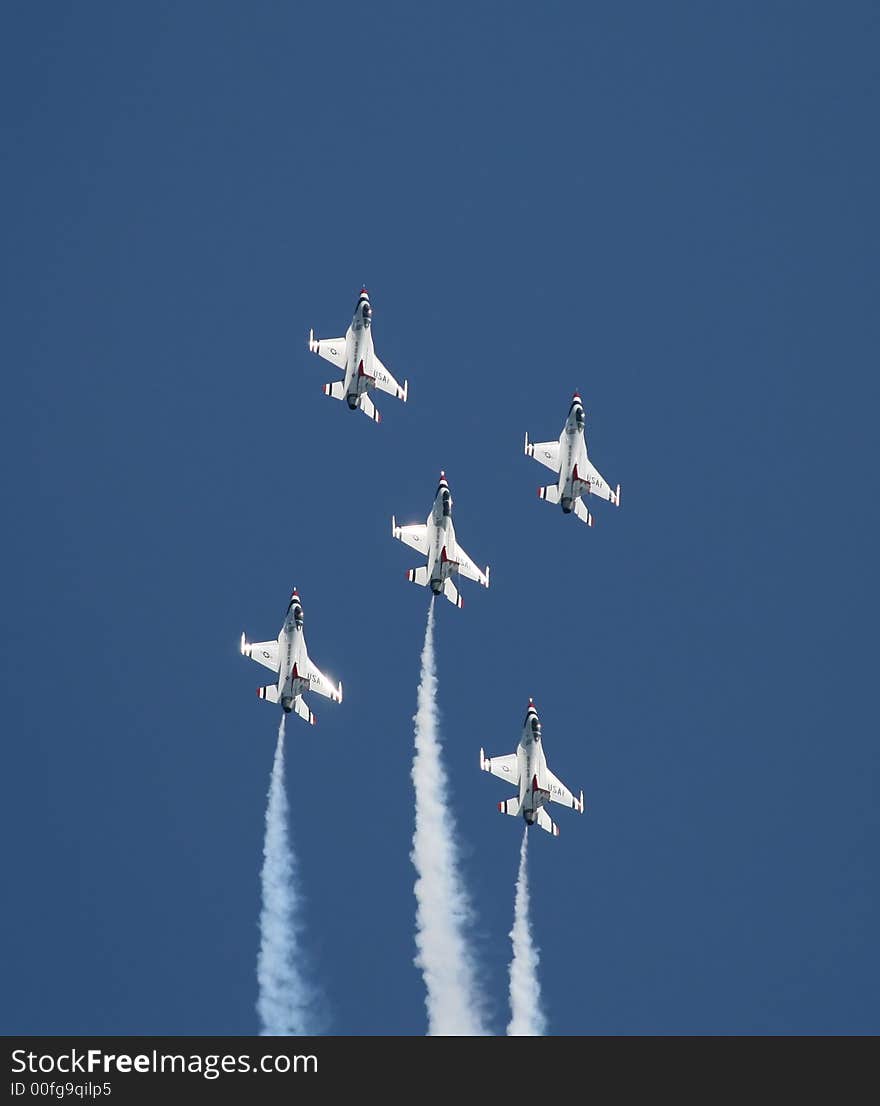 A fighter formation at a air show. A fighter formation at a air show