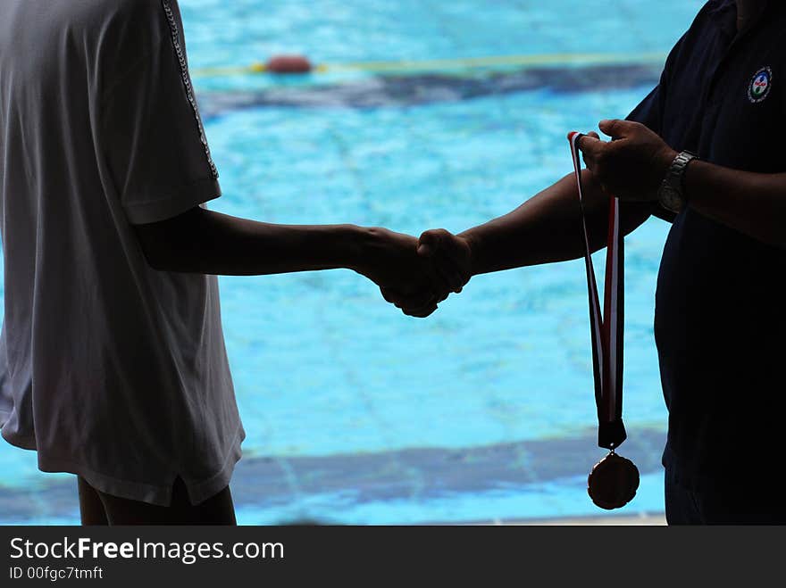 Swimming competition prize presentation in the sport center. Swimming competition prize presentation in the sport center