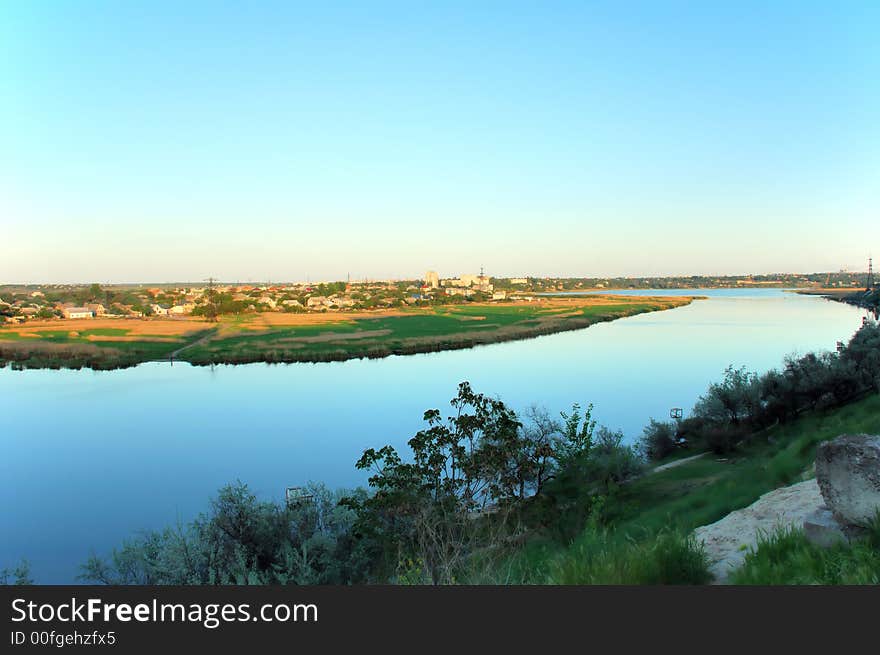 River and blue sky scenic on sunset background. River and blue sky scenic on sunset background