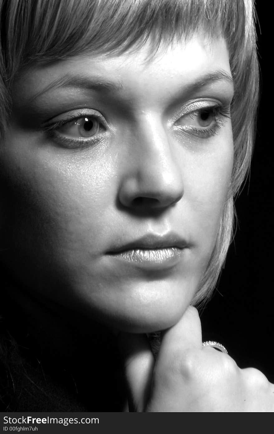 A image of young girl in dark room. A image of young girl in dark room