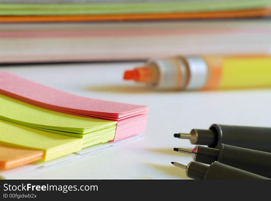 First plane of a writing-desk with notes of different colors to remember. First plane of a writing-desk with notes of different colors to remember