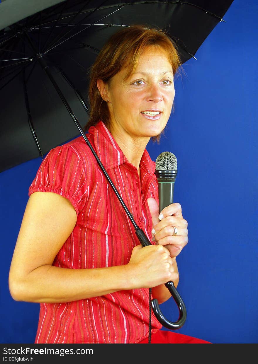 Just singing in the rain or lady with mic.