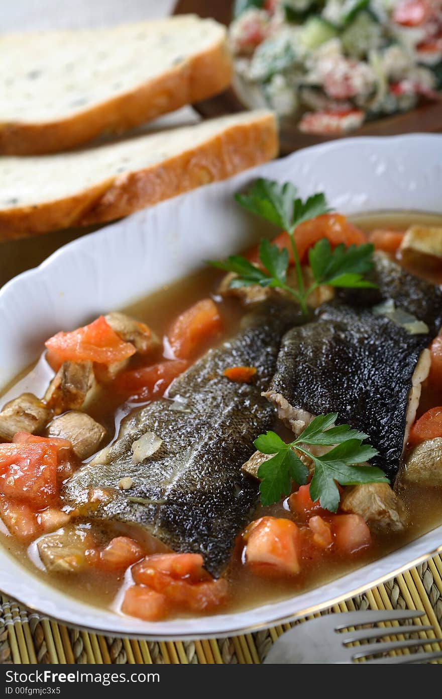 Cod in the bowl with  vegetables and bread. Cod in the bowl with  vegetables and bread