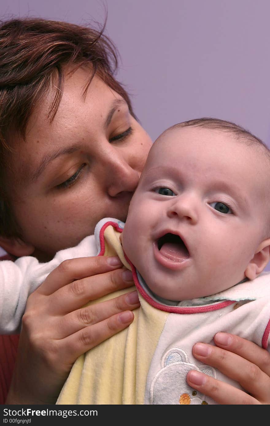 Loving mother with his child inside the house. Loving mother with his child inside the house