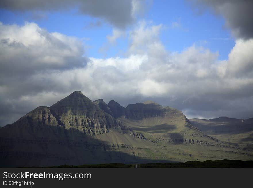 Sunlit green mountains in Iceland. Sunlit green mountains in Iceland