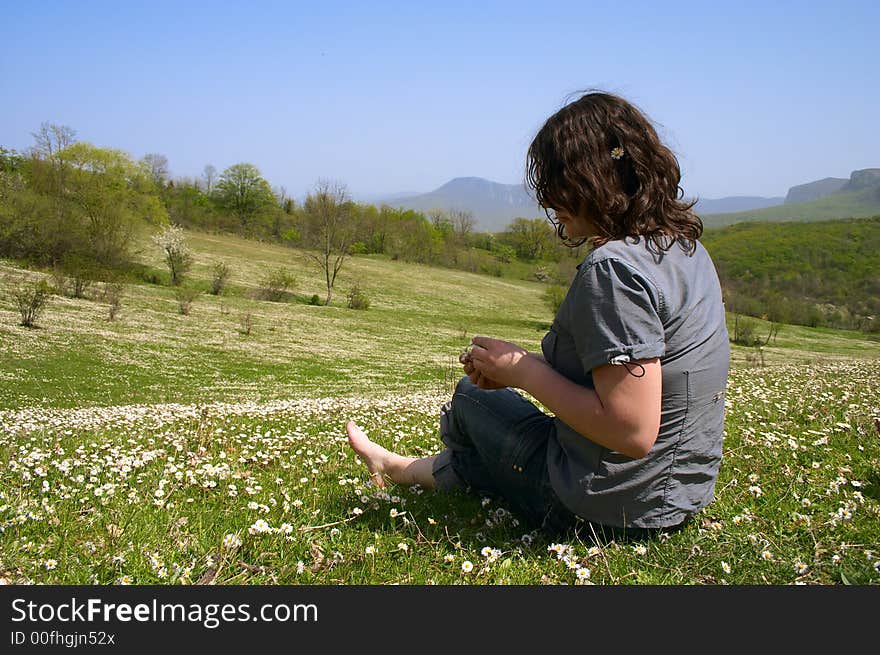 Girl on  daisy flower