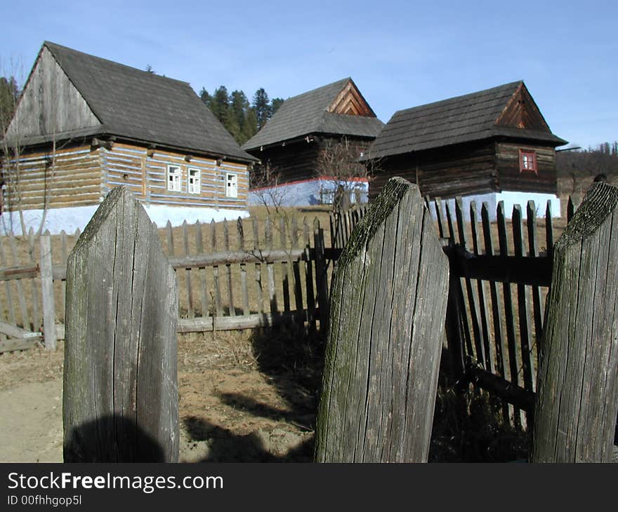 View  of traditional slovak village with old buildings made of wood. View  of traditional slovak village with old buildings made of wood.