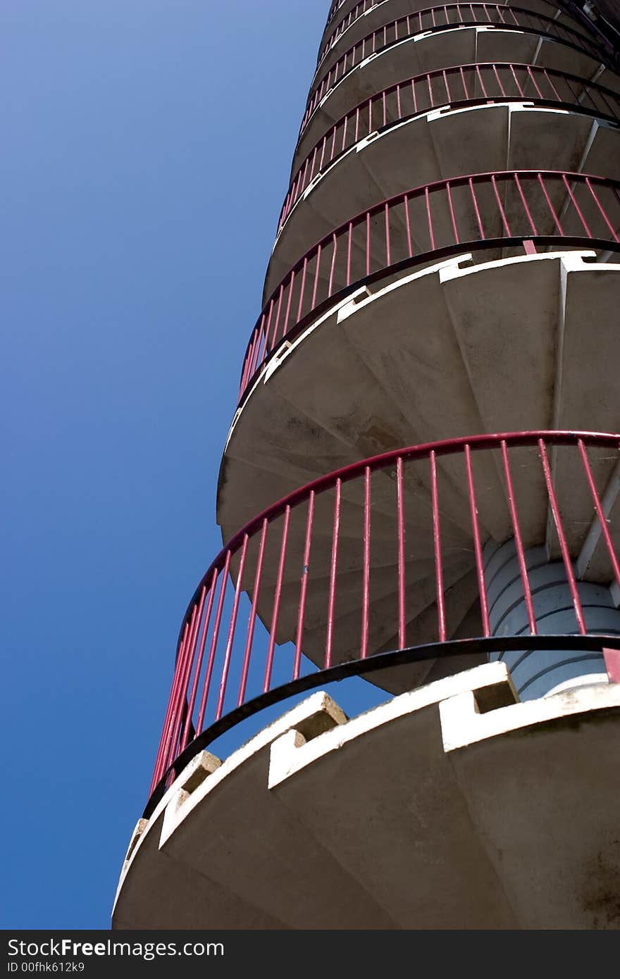 Spiral staircase against a clear blue sky

<a href=http://www.dreamstime.com/search.php?srh_field=building&s_ph=y&s_il=y&s_sm=all&s_cf=1&s_st=wpo&s_catid=&s_cliid=301111&s_colid=&memorize_search=0&s_exc=&s_sp=&s_sl1=y&s_sl2=y&s_sl3=y&s_sl4=y&s_sl5=y&s_rsf=0&s_rst=7&s_clc=y&s_clm=y&s_orp=y&s_ors=y&s_orl=y&s_orw=y&x=32&y=17> See more buildings</a>