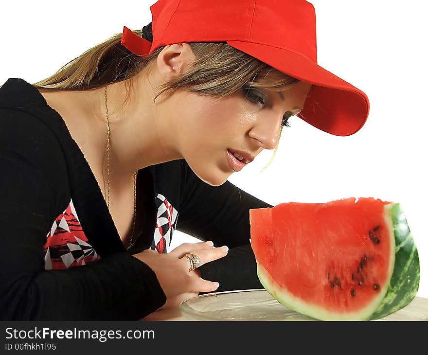 Young woman eating watermelon, isolated on white background