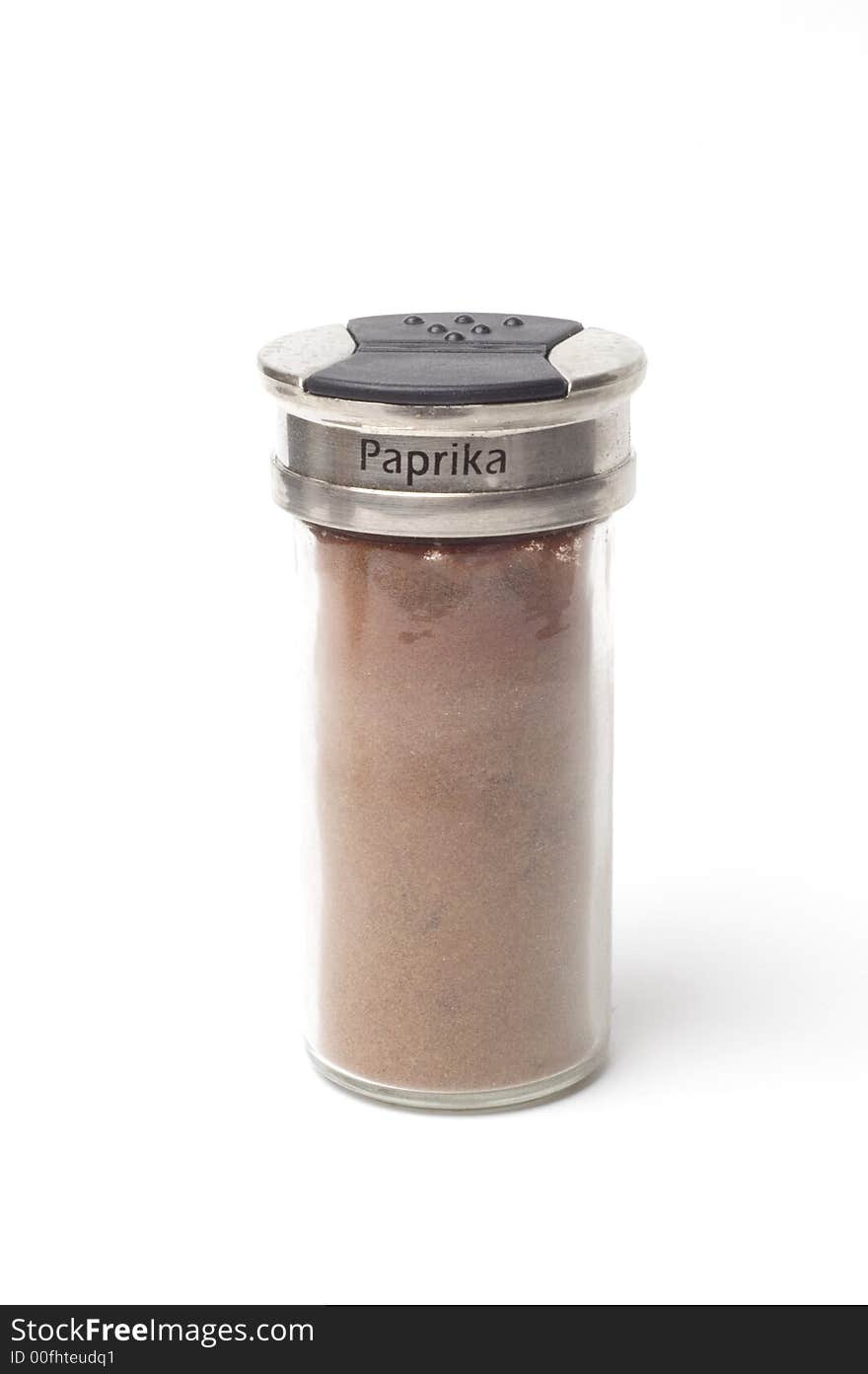 A jar of Paprika isolated on a white backgorund