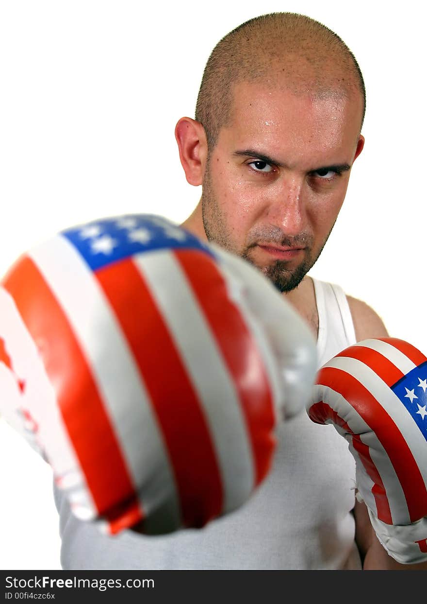 Boxer with red gloves (focus on the face), isolated on white