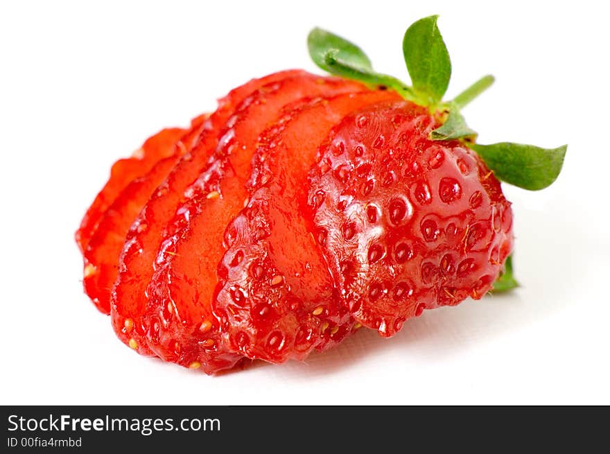 Segments of a fresh juicy ripe strawberry. Segments of a fresh juicy ripe strawberry