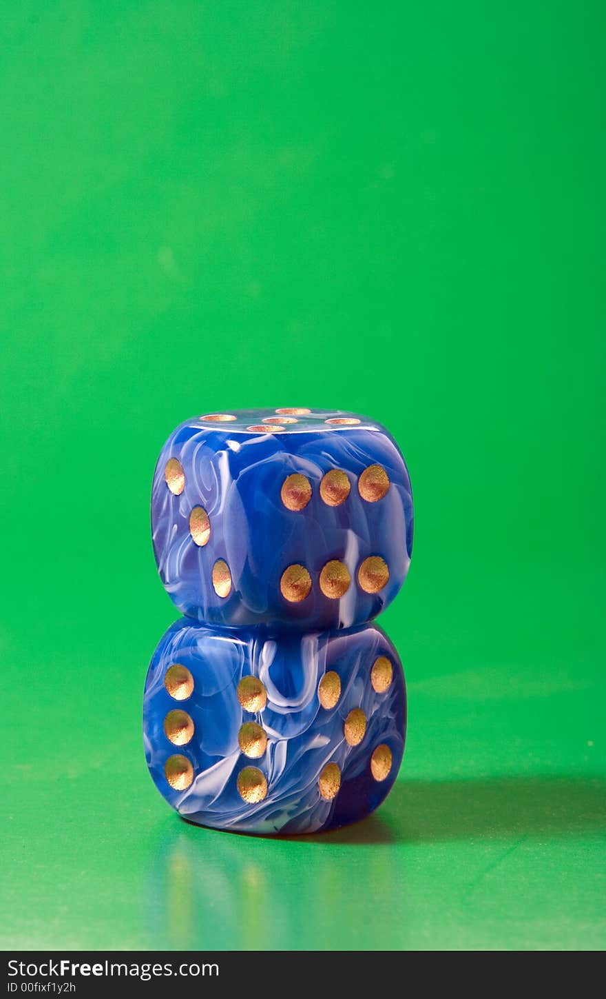 Two blue dices on green