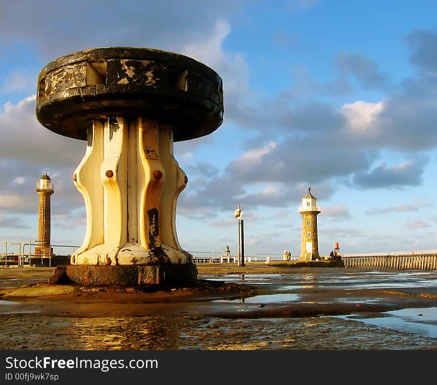 Close-up view of old capstan on Whitby pier. Taken in afternoon sunlight.