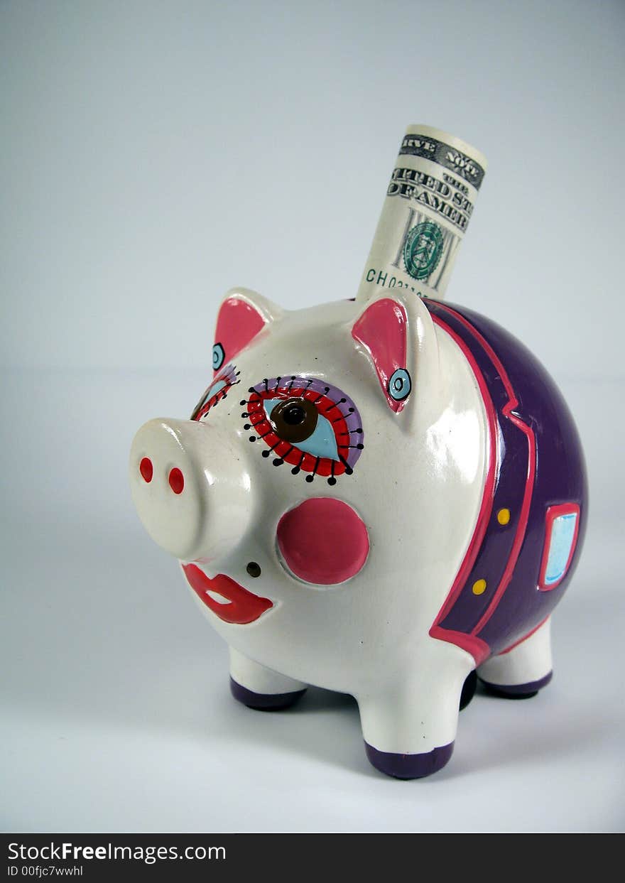 Piggy bank,pink ceramic ,piggy bank with a money. Piggy bank,pink ceramic ,piggy bank with a money