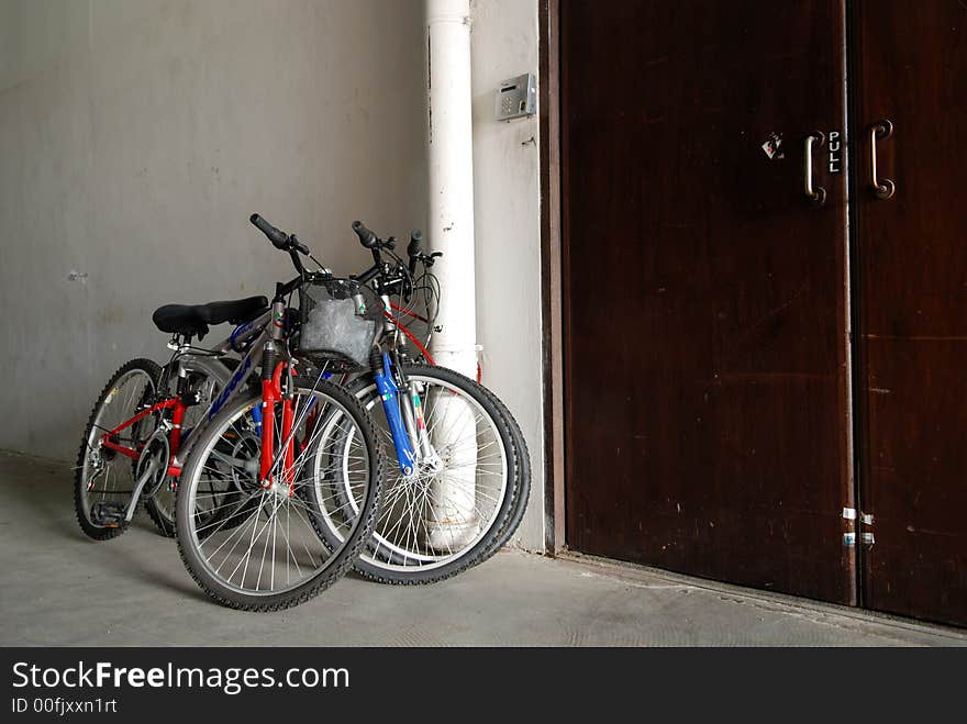 Bicycles locked  at the pipe