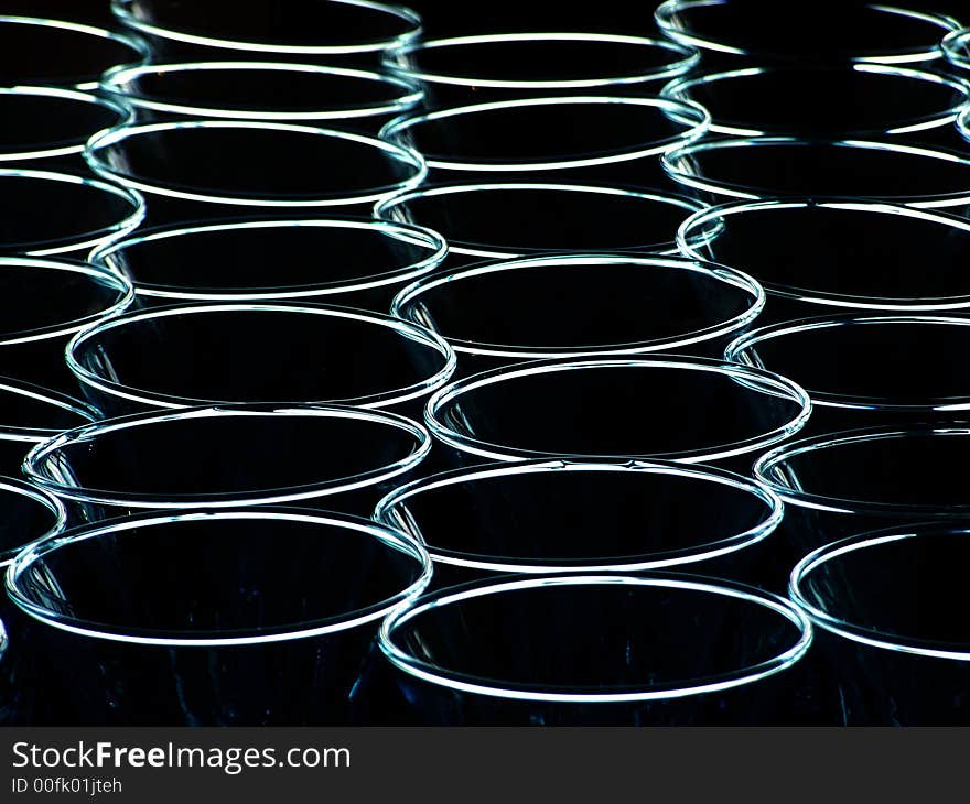 Light in circles reflecting of the top of glasses. Light in circles reflecting of the top of glasses