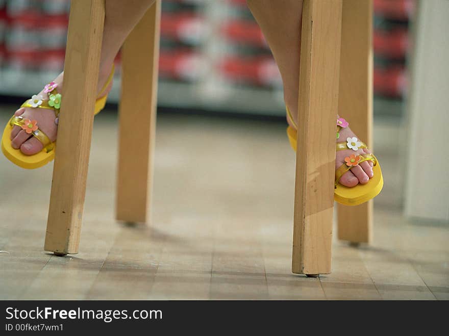 A little girl's yellow shoes. A little girl's yellow shoes