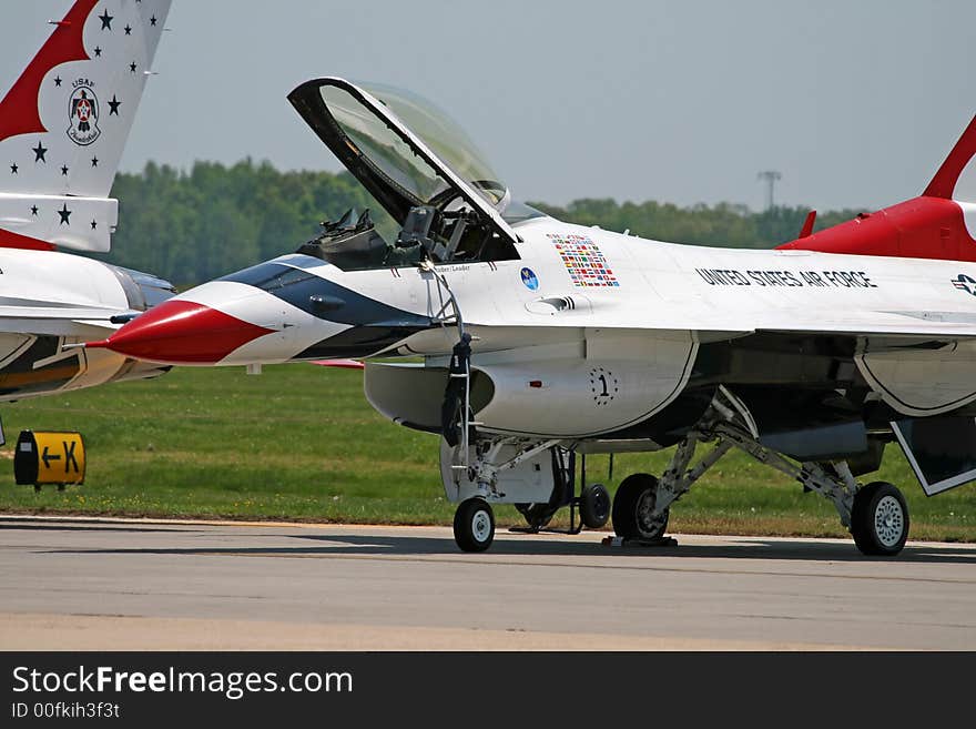 A fighter performed at a air show. A fighter performed at a air show