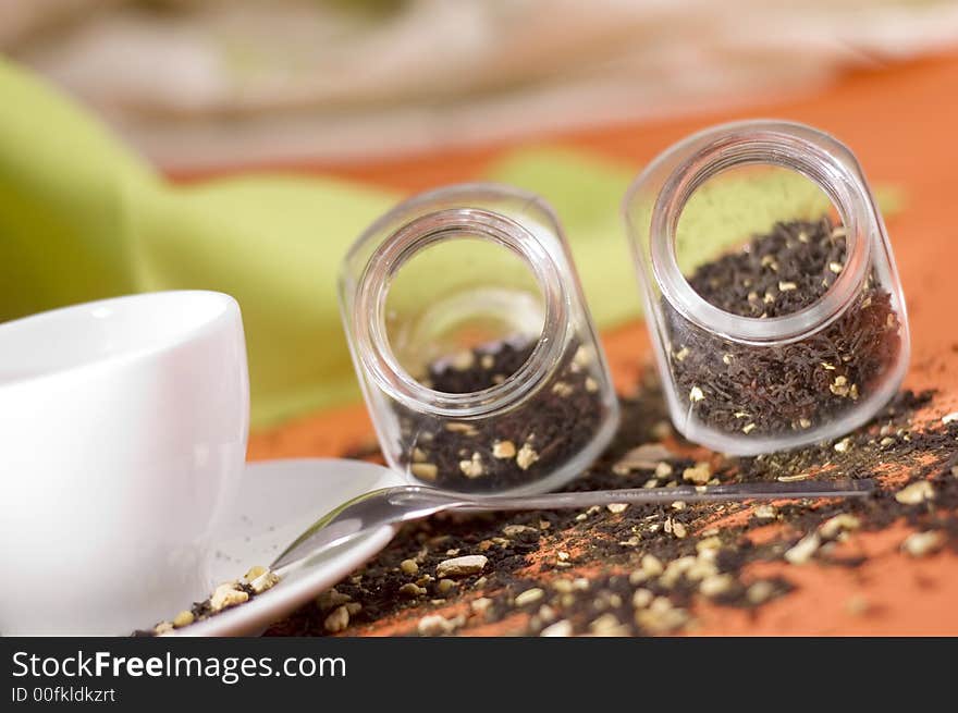 Tea and white cup on the orange background. Tea and white cup on the orange background