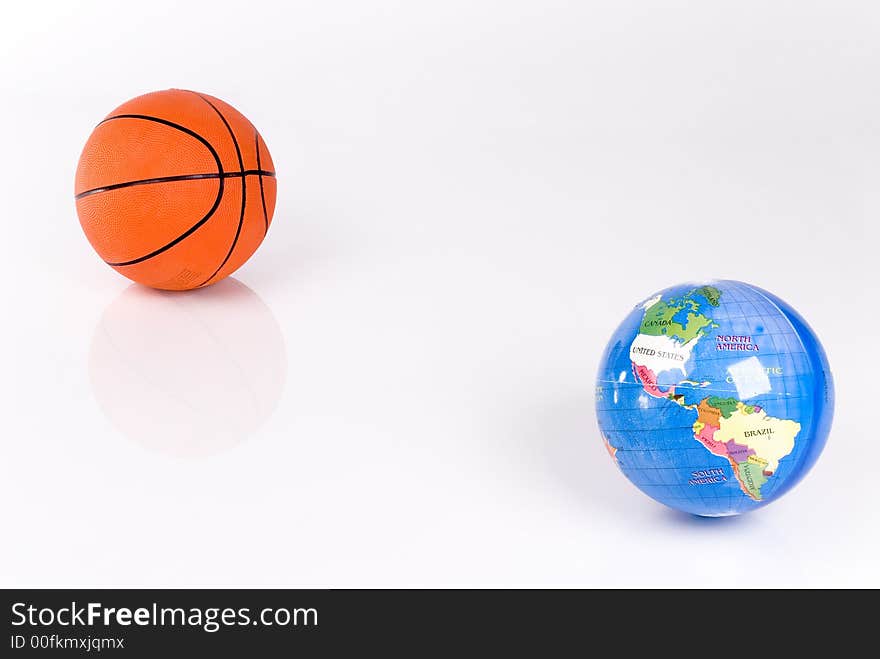 Basketball ball and the globe on a white background