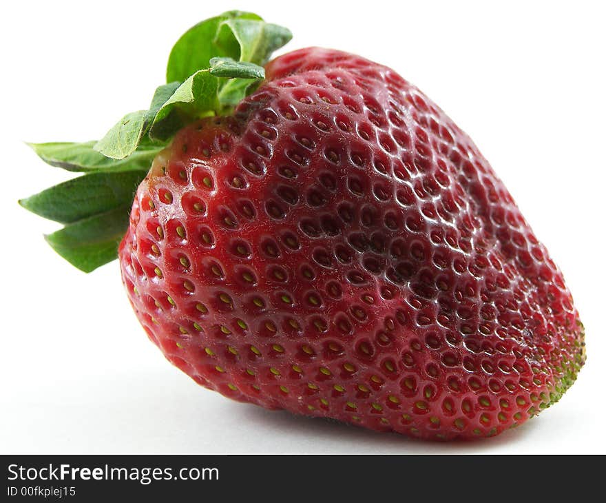 Macro photo of a strawberry against a white background