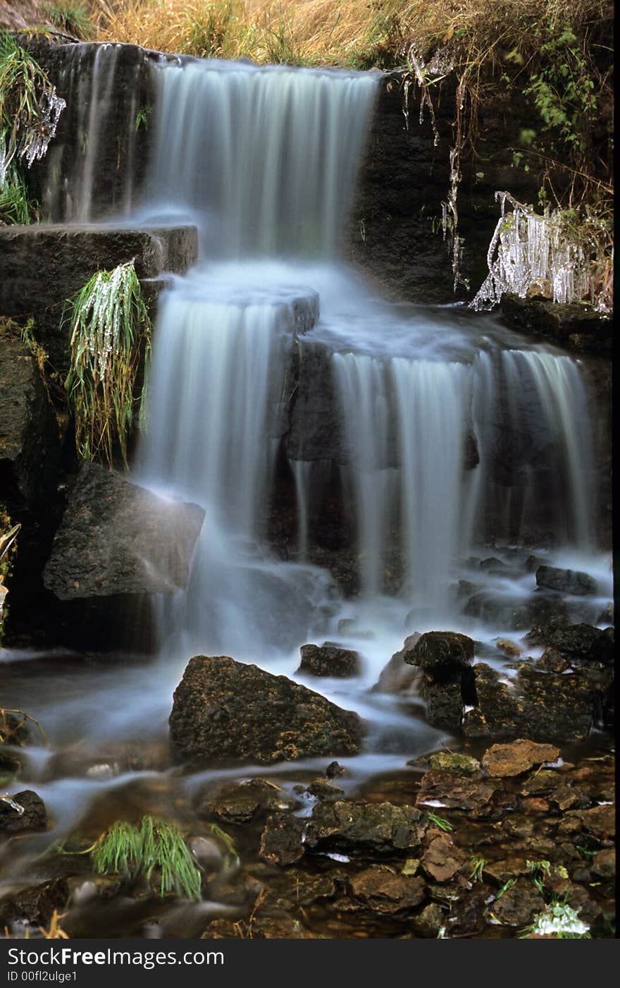 Autumn waterfall ice and rocks. Autumn waterfall ice and rocks