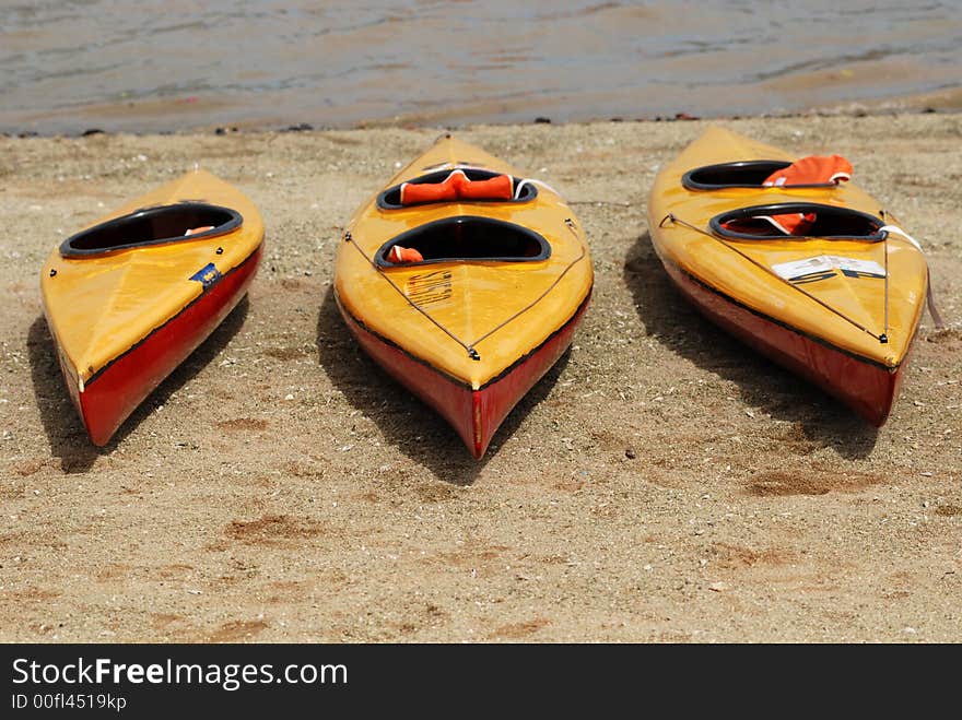 Canoes On The Beach