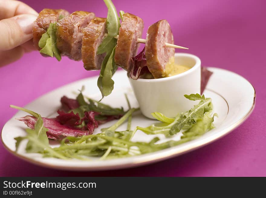 Sausage with salad