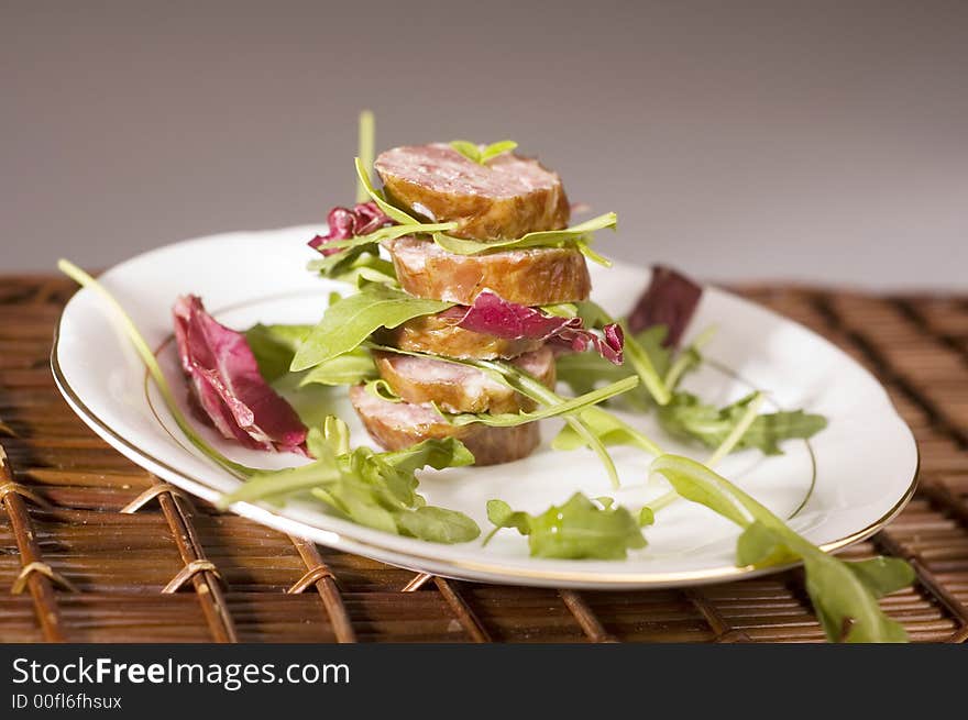 Sausage with salad