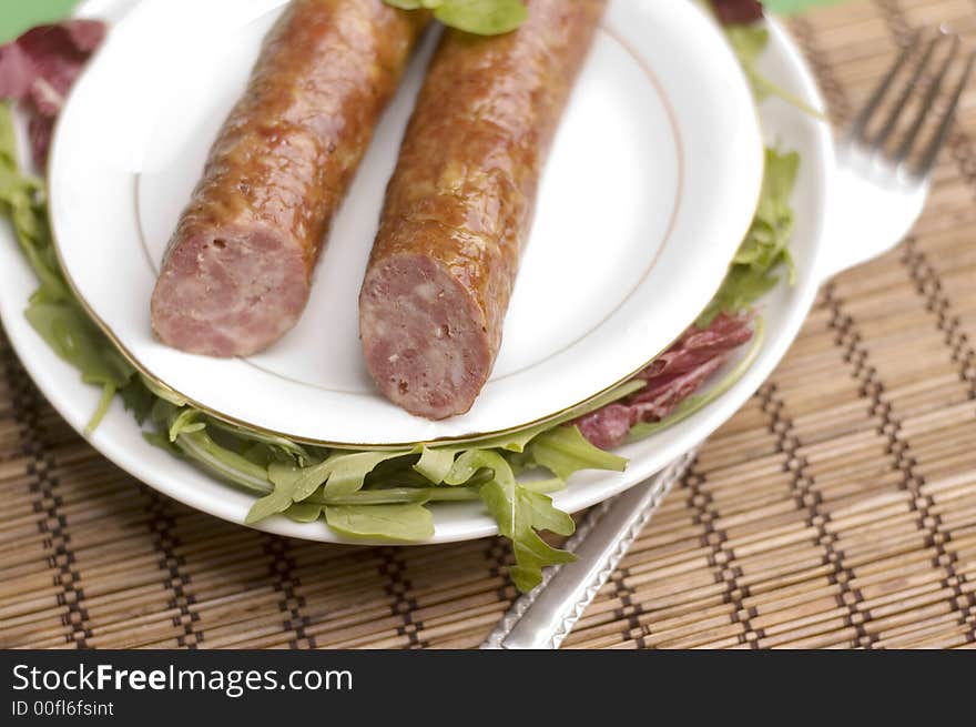 Sausage with salad