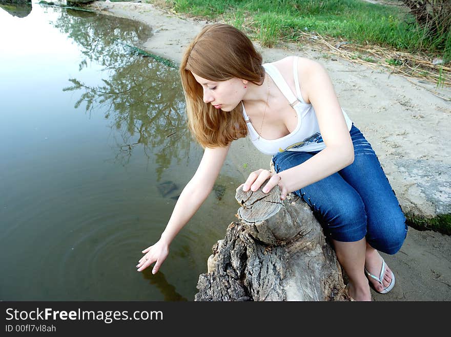 Girl on coast of river