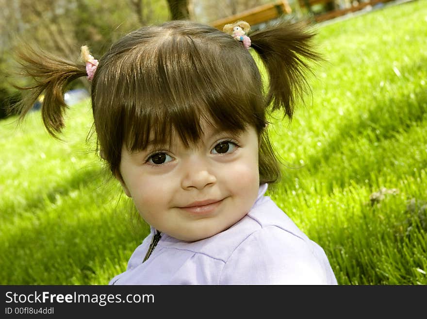 Happy Girl In Grass