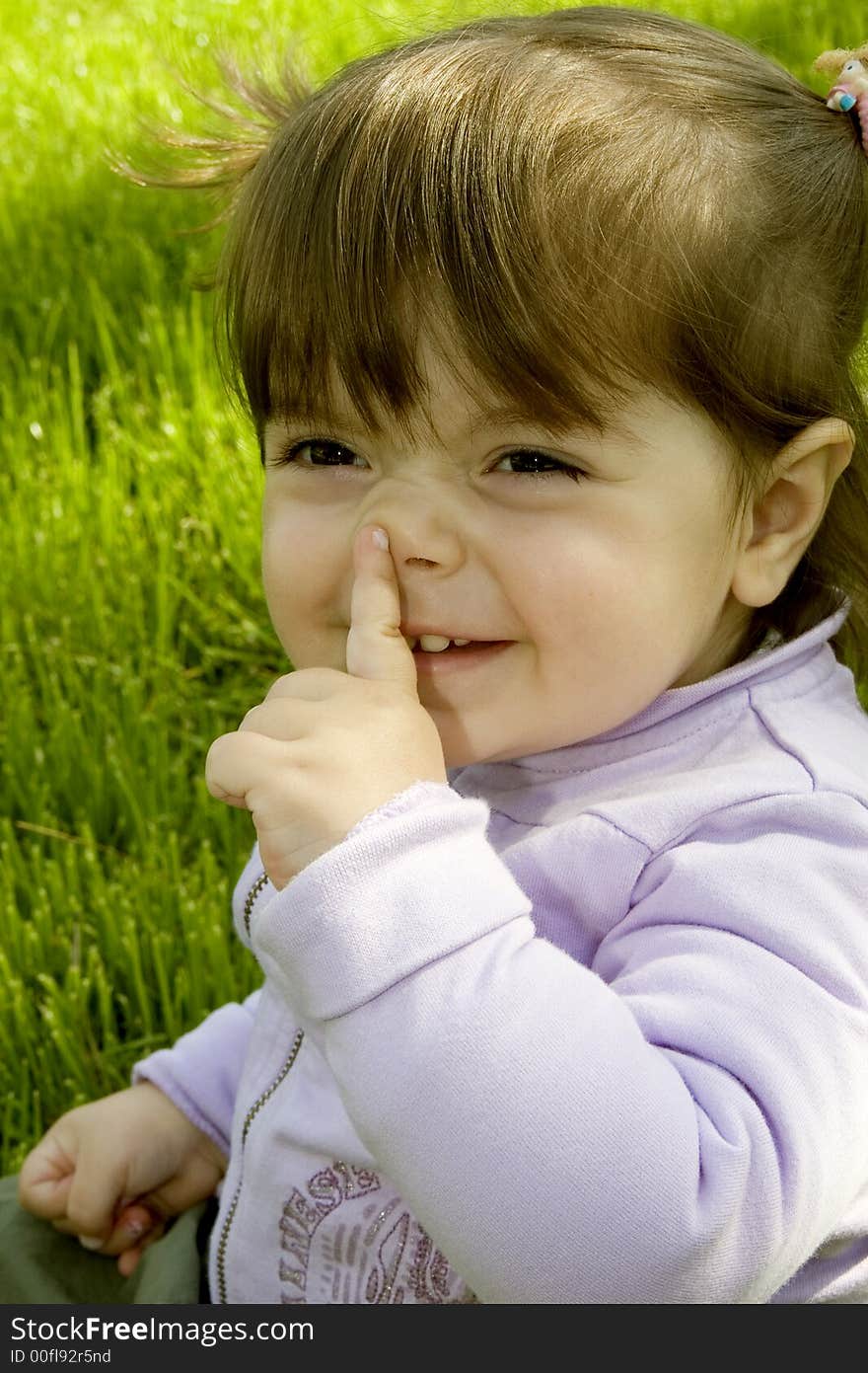 Happy girl in grass