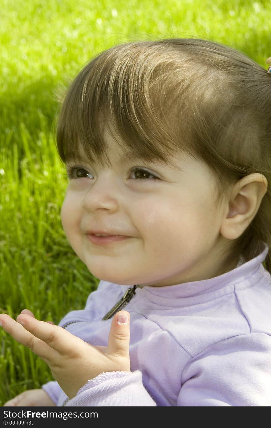 Happy Girl In Grass