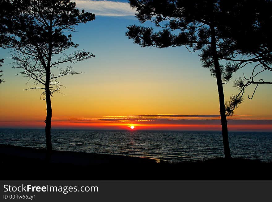 Red orange sunset Baltic Sea in Poland